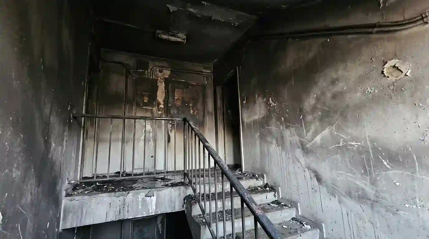 Smoke-stained stairwell after a battery fire